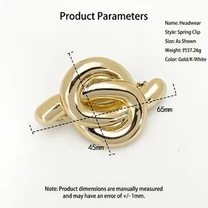 Pince à cheveux noeud doré minimaliste 65mm accessoire de tête en métal