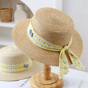 Minimalist wide brim straw fisherman hat with plaid ribbon and blue puppy charm