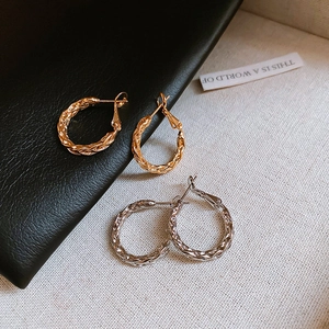 Classic braided metal hoop earrings in gold and silver finish with twisted rope texture