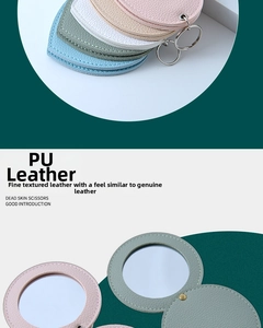 Detailed close-up of colorful PU leather pocket mirrors with textured stitching and keyring
