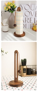 Detailed view of walnut wood paper towel holder with stable base and weighted lanyard