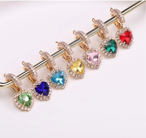 Detailed view of heart-shaped crystal pendants in seven colors with gold plating