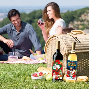Merry Christmas wine bottle labels featuring festive illustrations on a picnic setting