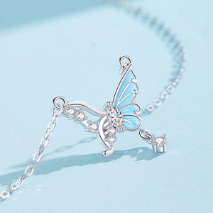 Elegant hollow butterfly necklace pendant in silver with blue enamel and sparkling zircons