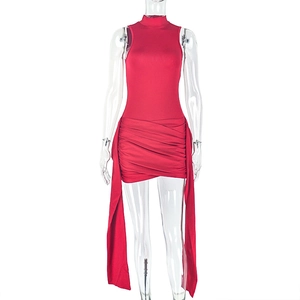 Detail of red sleeveless mini dress featuring high neck and side dangling straps