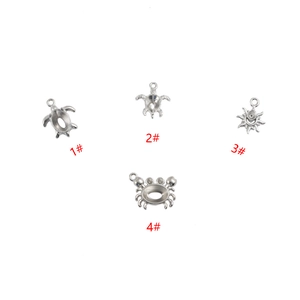 Silver stainless steel DIY pendants featuring sea turtle and crab charms for jewelry