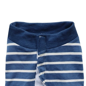 Detail of dog recovery suit showing blue and white stripes with a dark blue ribbed neckline
