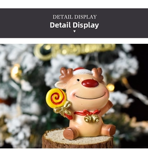 Close-up of a cute Christmas reindeer resin figurine wearing a red hat and holding a lollipop