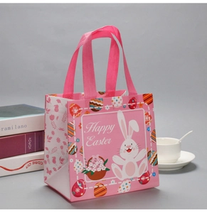 Detailed view of pink Easter gift bag with white bunny pattern and side thickness