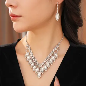 Luxurious silver water drop rhinestone fringe necklace and earrings set for formal events