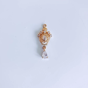 Detailed view of 18K gold plated hollow crown water drop pendant with micro zircon