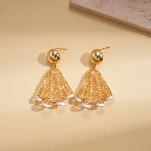 Detail of 18K gold plated hollow fan-shaped earrings with white pearl accents