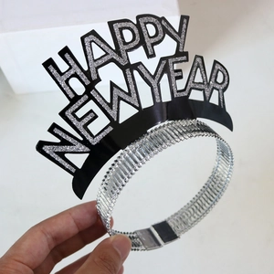 Black and silver Happy New Year headband featuring festive glitter foil lettering