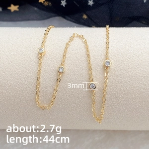 Minimalist gold choker necklace with 3mm round cubic zirconia stones for women
