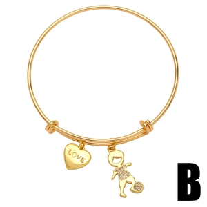 Gold adjustable bangle with engraved heart and sparkling zircon soccer boy pendants