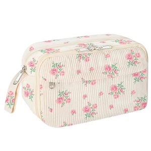Detail of floral corduroy pencil case showing pink rose print and double zippers