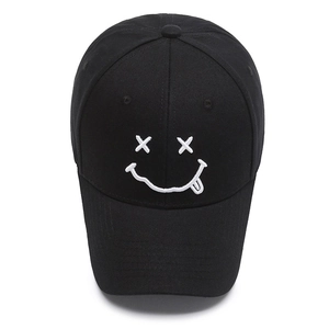 Classic black cotton baseball cap with white embroidered funny smiley face pattern