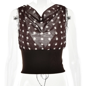 Detail of polka dot sheer mesh fabric with cowl neck and brown ribbed waist design