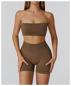 Detail of seamless yoga set showing high-waisted shorts and supportive ribbed bandeau top