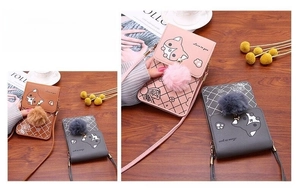 Three mini fox crossbody phone bags in pink, brown, and gray with plush pompom charms