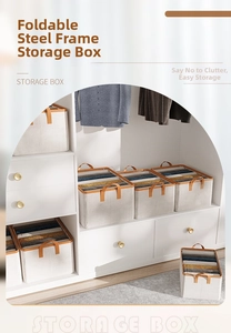 Stackable foldable storage boxes with steel frames and leather handles in a white closet