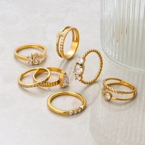 Elegant 18K gold plated stainless steel ring set featuring white zircon and hollow designs