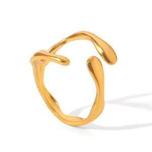 Macro view of gold-plated open ring with irregular organic lava texture and modern design