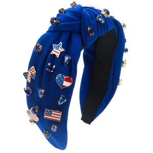 Macro detail of royal blue knotted headband featuring rhinestone and US flag charms