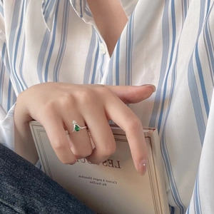 925 silver ring with water-drop green gemstone worn by a model in lifestyle setting