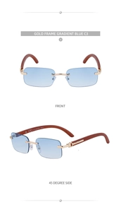 Detail of rimless sunglasses with blue gradient lenses and dark wood grain temples