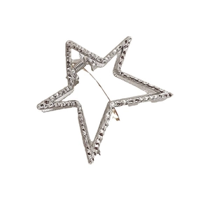 Y2K silver star claw clip with a hollow design and textured metallic finish for women