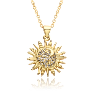 Gold celestial sun and moon pendant necklace with sparkling cubic zirconia pavé