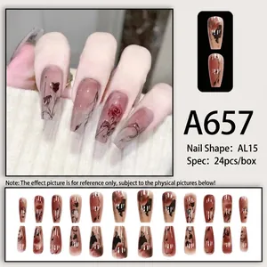 Faux ongles trapèze longs rose translucide avec motifs de roses rouges et de vignes noirs