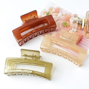 Translucent amber, beige, and olive green resin hair claw clips set for daily styling