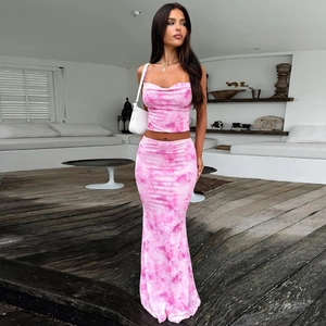 Detail of pink tie-dye crop top and high waist mermaid skirt set for women