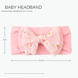 Pink nylon baby headband featuring double-layer mesh bow with daisy print and size detail
