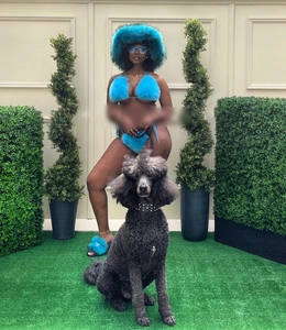 Faux fur bikini set and fluffy hat combo in vibrant blue, shown on model lifestyle scene