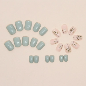 Short square press-on nails with mint green gradient and leaf patterns, 24-piece set