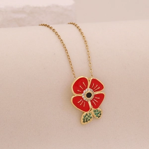 Collier doré avec pendentif vintage rose rouge en cœur et détails de feuilles en cristal