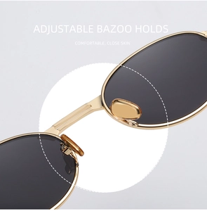 Detail of adjustable nose pads on gold metal steampunk sunglasses for comfort
