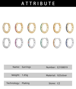 Detail of 925 sterling silver hoop earrings with colorful CZ stones in gold and silver