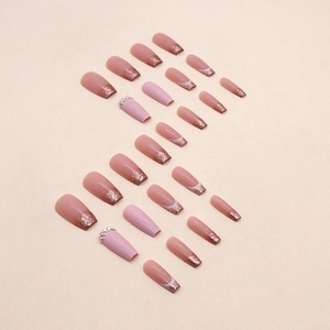 Long coffin press-on nails with pink gradient glitter and rhinestone French accents