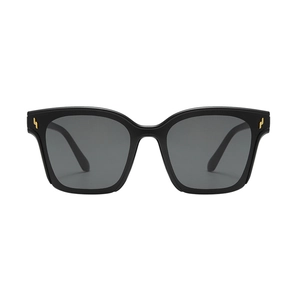 Fashionable oversized black sunglasses with gold lightning accents and UV lenses