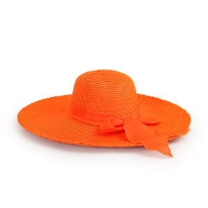 Detailed view of the bright orange straw hat featuring a stylish ribbon bow and fine texture