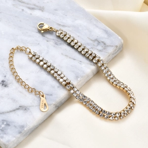 6mm double row zirconia tennis bracelet in 14K gold plated stainless steel on marble