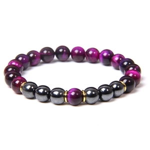 Detail of 8mm purple tiger eye beads and hematite stones on an elastic bracelet