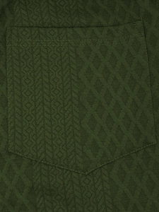 Detailed close-up of dark green hooded sweatshirt with geometric jacquard fabric and side pocket