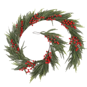 Christmas pine needle garland with red berries in a spiral layout for holiday decor
