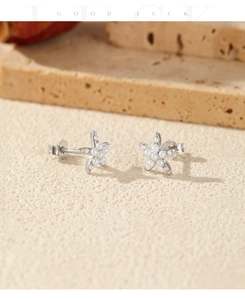 Close-up of elegant S925 sterling silver starfish earrings with white pearls