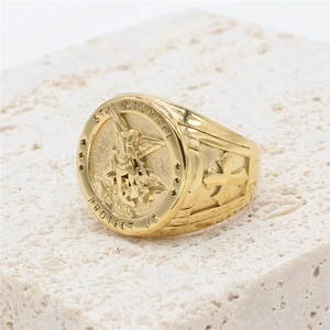 Golden St. Michael Archangel wing ring in stainless steel with cross engraving
